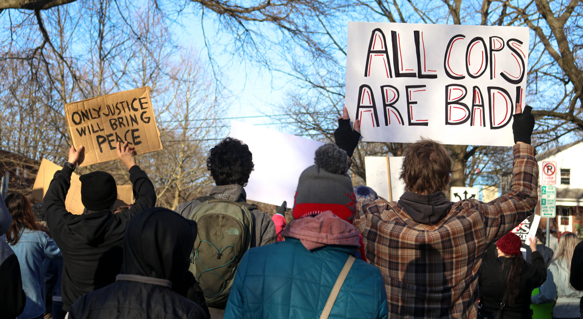 3/20 March; Two Years Too Late, protestors